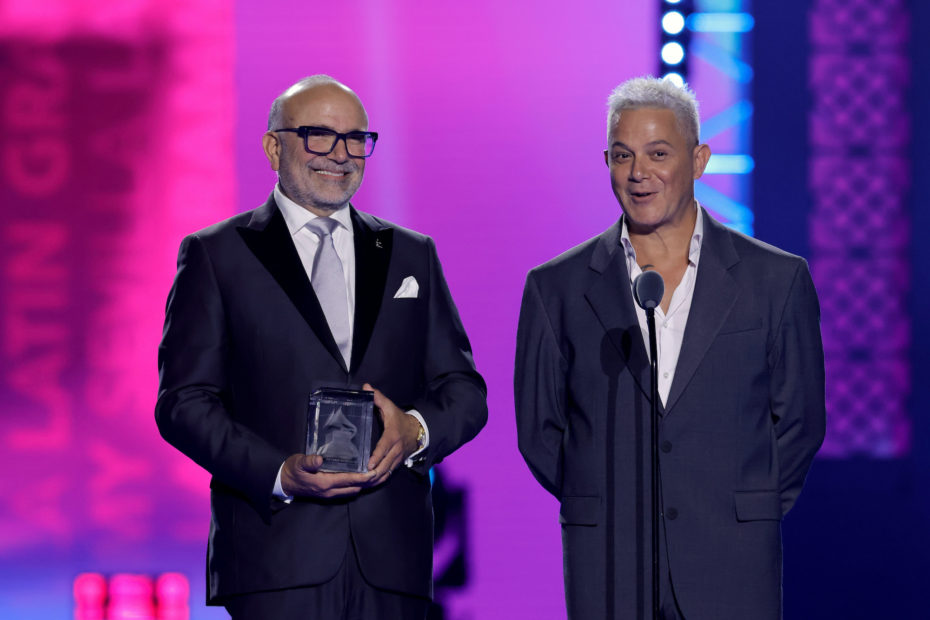 SEVILLE, SPAIN - NOVEMBER 16: (L-R) Manuel Abud, CEO, Latin Recording Academy and Alejandro Sanz speak onstage during The 24th Annual Latin Grammy Awards on November 16, 2023 in Seville, Spain. (Photo by Kevin Winter/Getty Images for Latin Recording Academy)